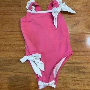 TBBC pink swimsuit with white bows